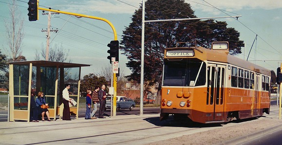 Picture of Z1 tram 'in action' along a Whyalla street, in its' 1970's BHP ochre livery.